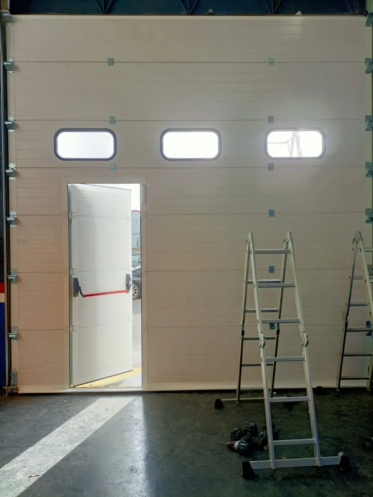 Réparation porte sectionnelle à Rosny sous Bois