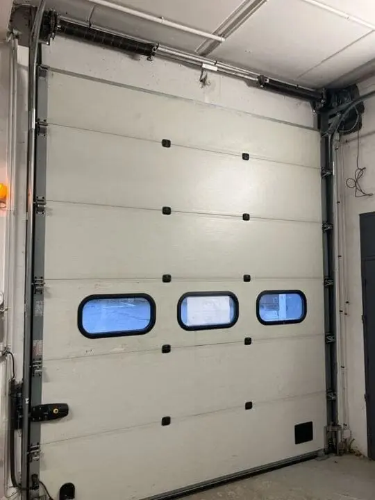 reparation-porte-sectionnelle-noisy-le-sec