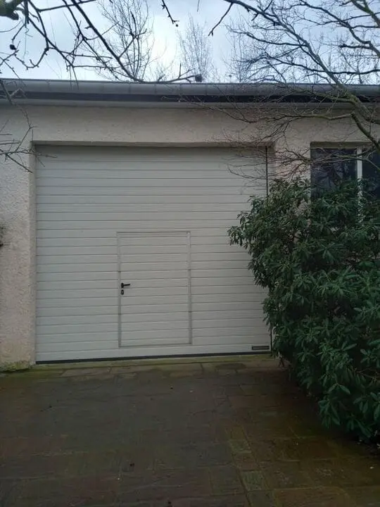 reparation-porte-sectionnelle-la-courneuve