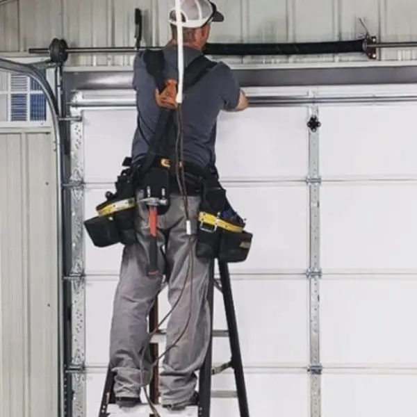 Réparation porte sectionnelle industrielle à Moissy Cramayel