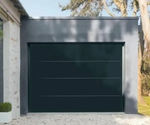 Réparation porte sectionnelle résidentielle à Noisiel