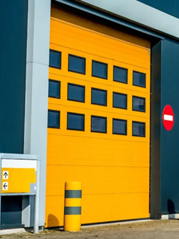 Réparation porte sectionnelle industrielle à Saint Fargeau Ponthierry