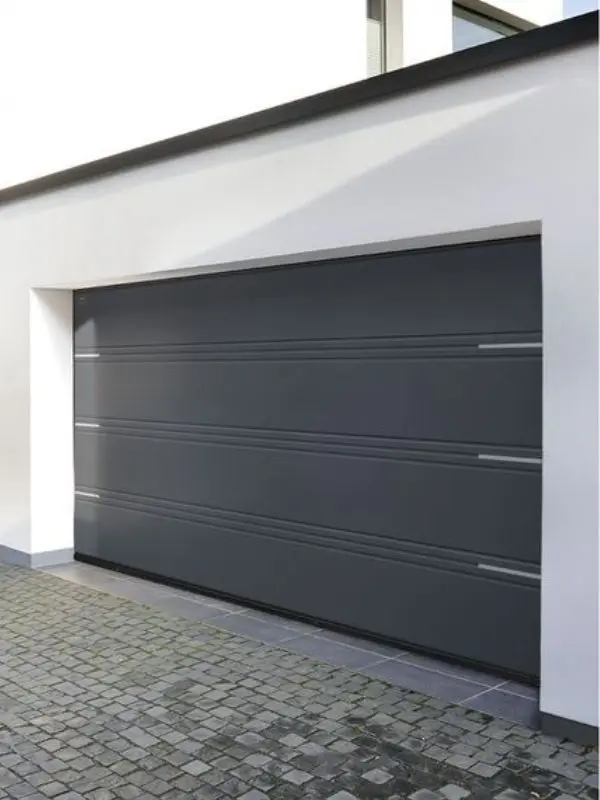 Réparation porte garage sectionnelle à Lognes