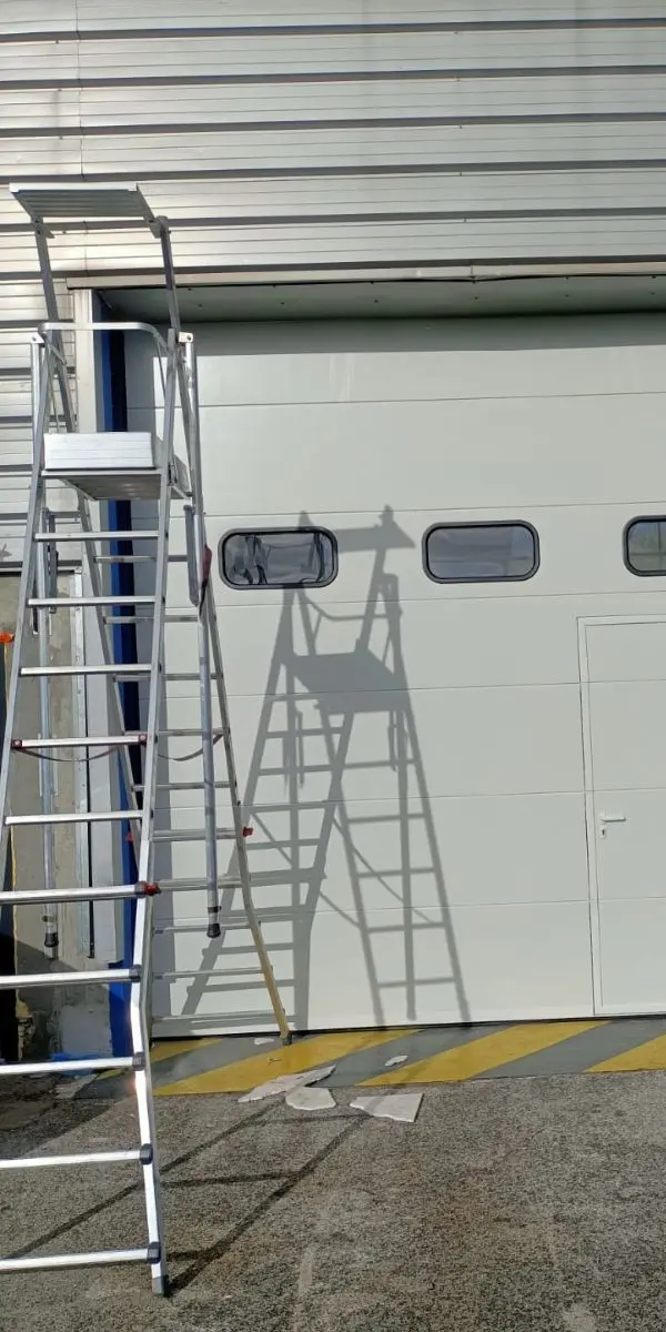 Réparation porte sectionnelle industrielle