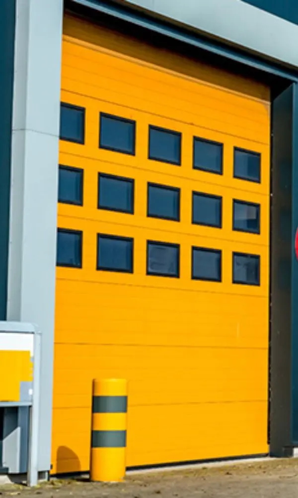 Réparation porte sectionnelle industrielle