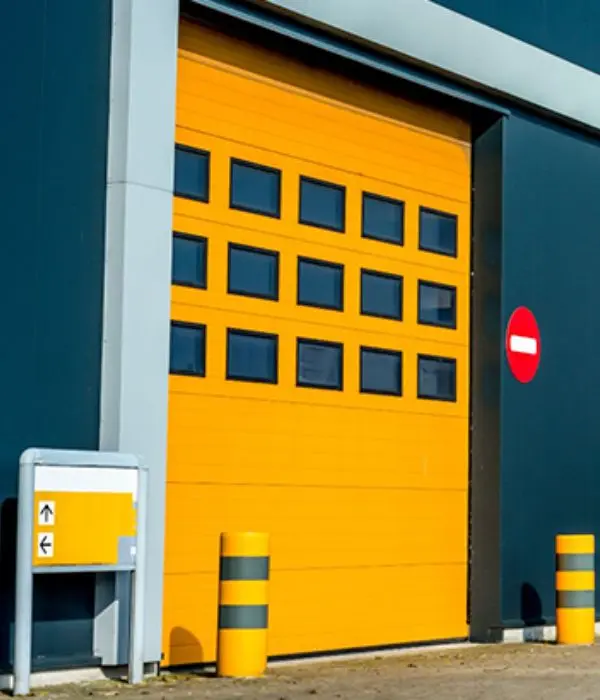 Réparation porte sectionnelle industrielle