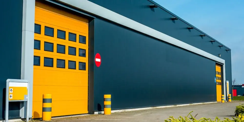 réparation porte sectionnelle industrielle à Tournan en Brie