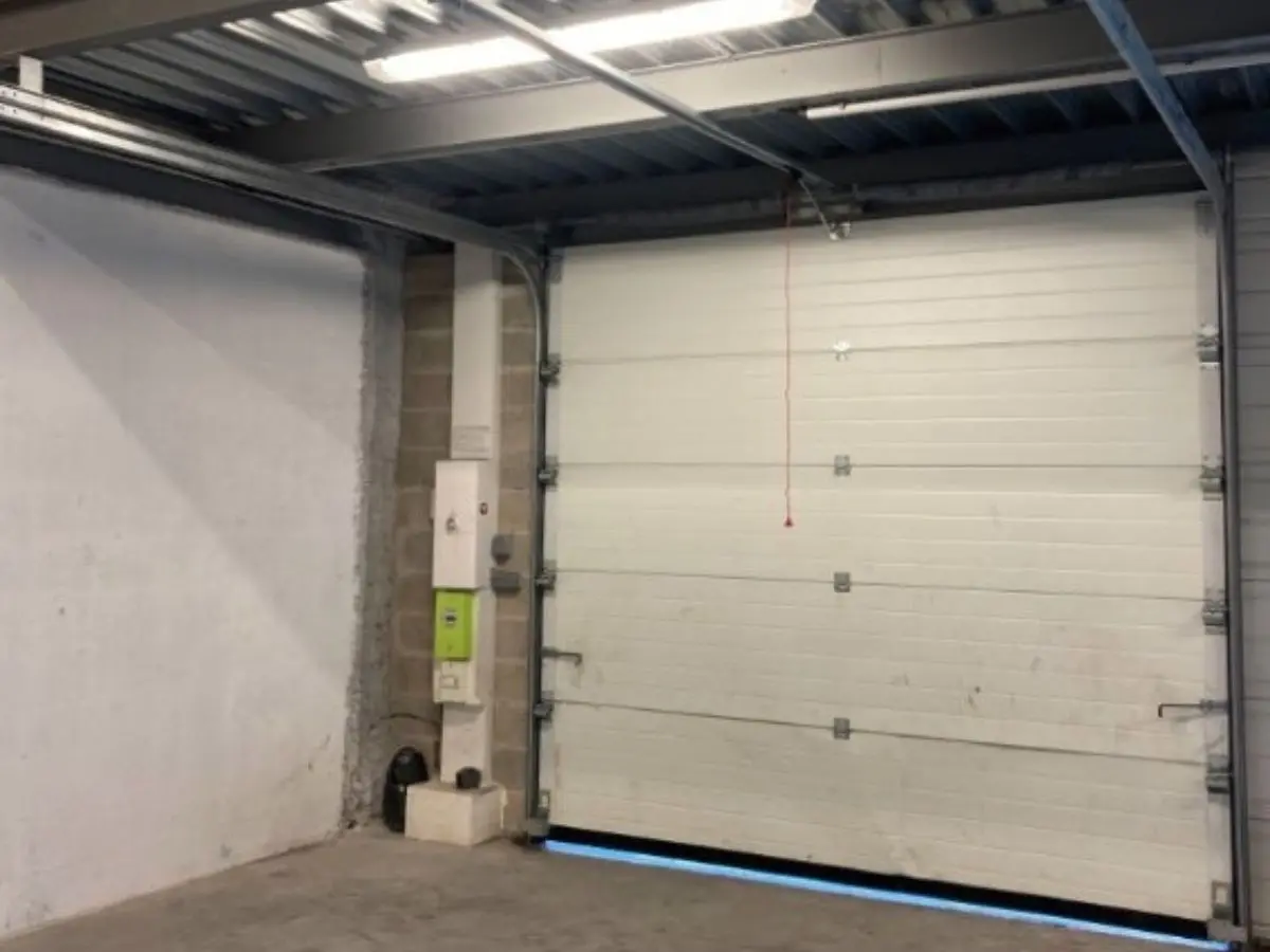 réparation porte garage à Mouroux