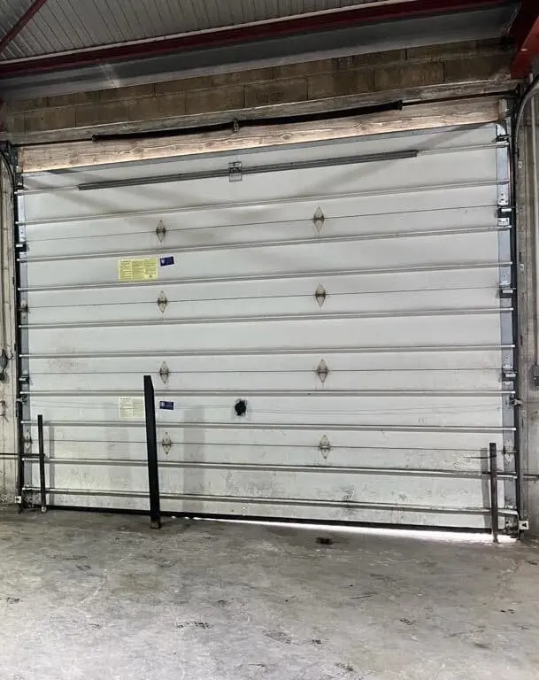 Réparation porte sectionnelle à Courbevoie