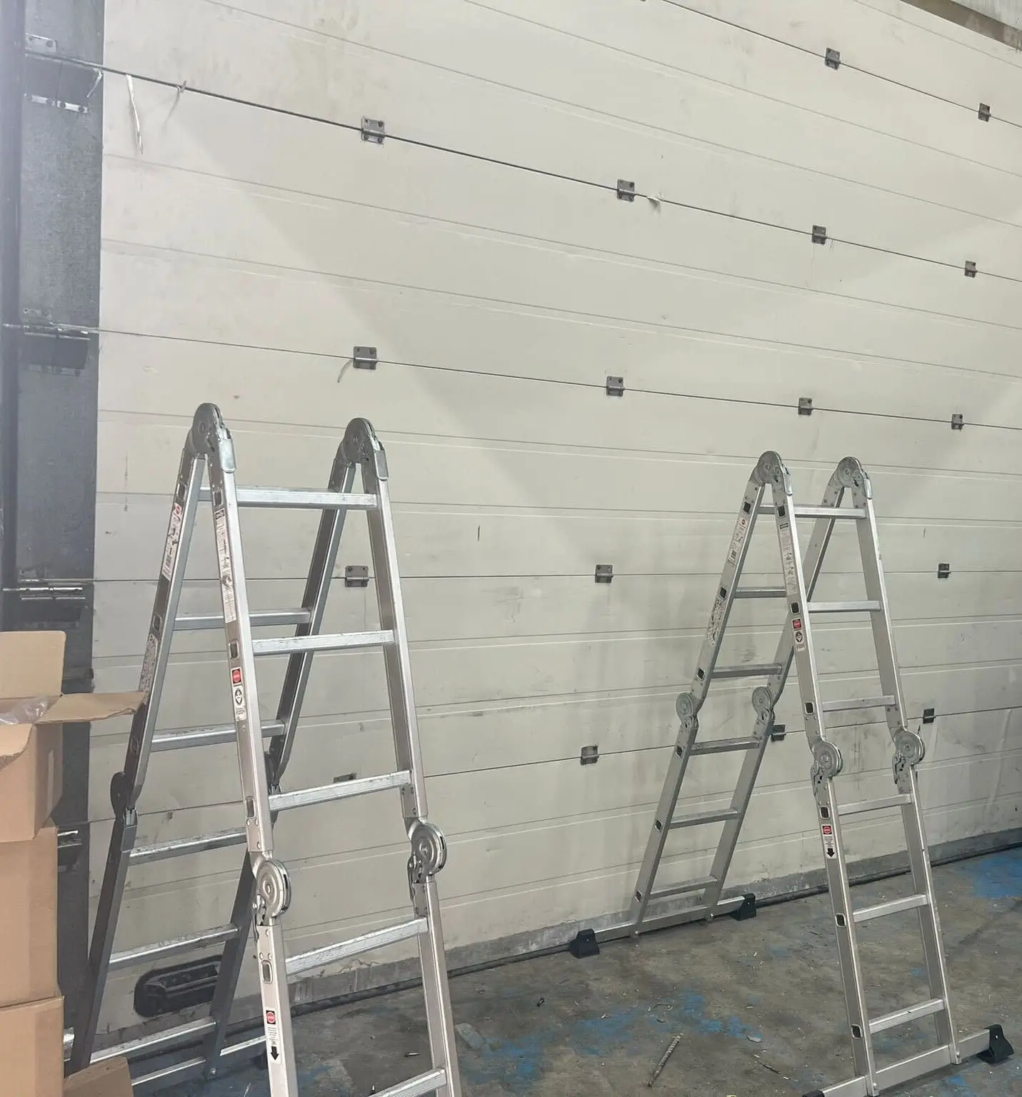 réparation de porte sectionnelle sur mesure à Pierrelaye