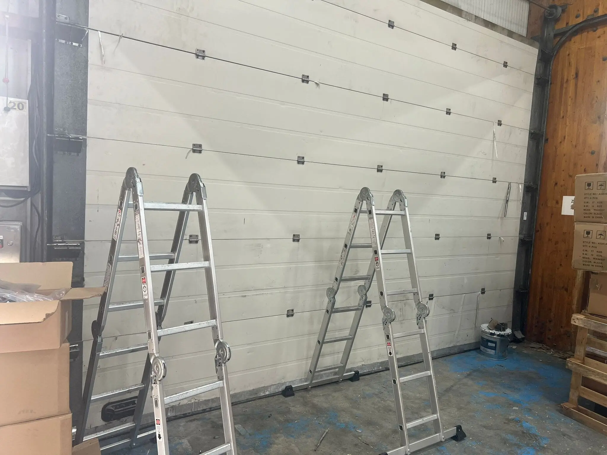 Réparation porte sectionnelle à Groslay