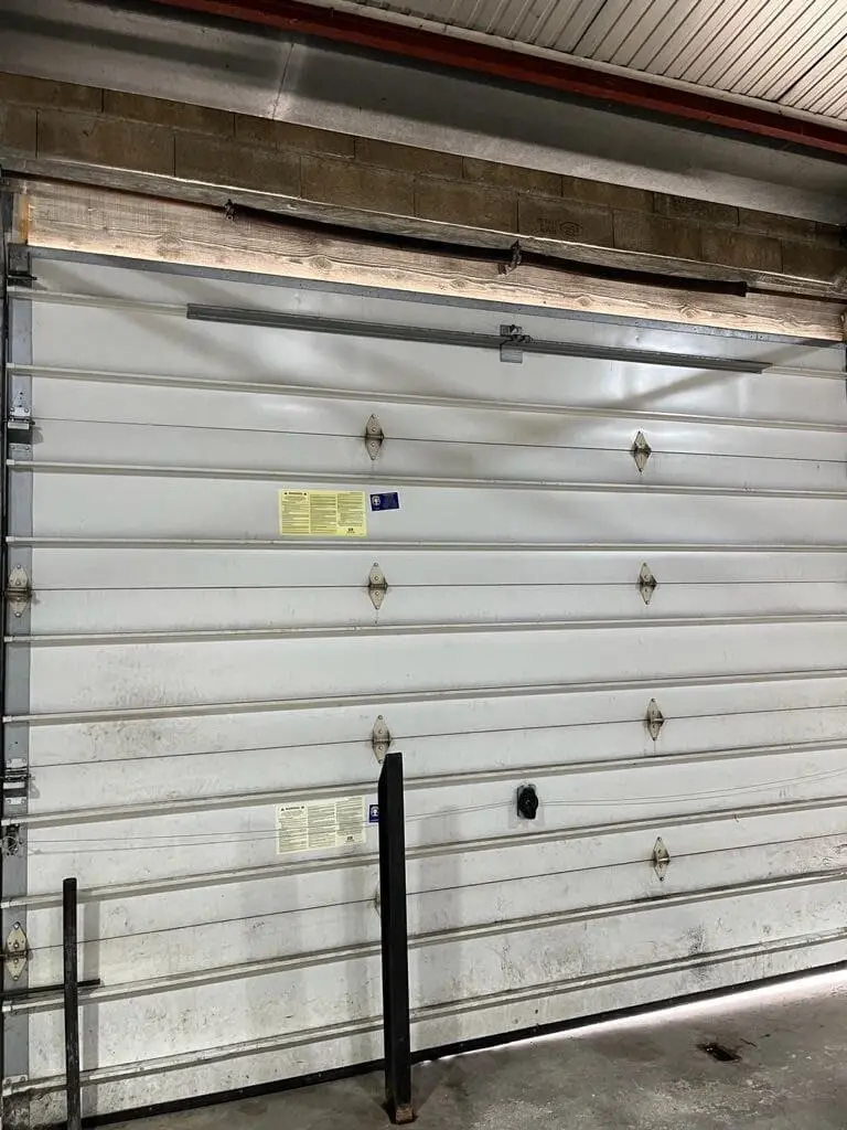 Réparation porte sectionnelle à Saint-Prix