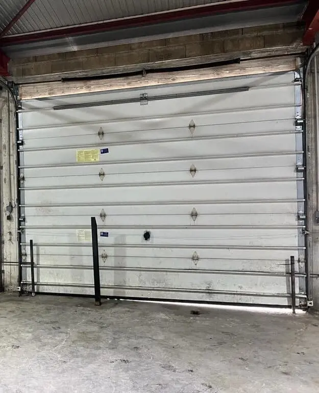 réparation porte sectionnelle à Écouen