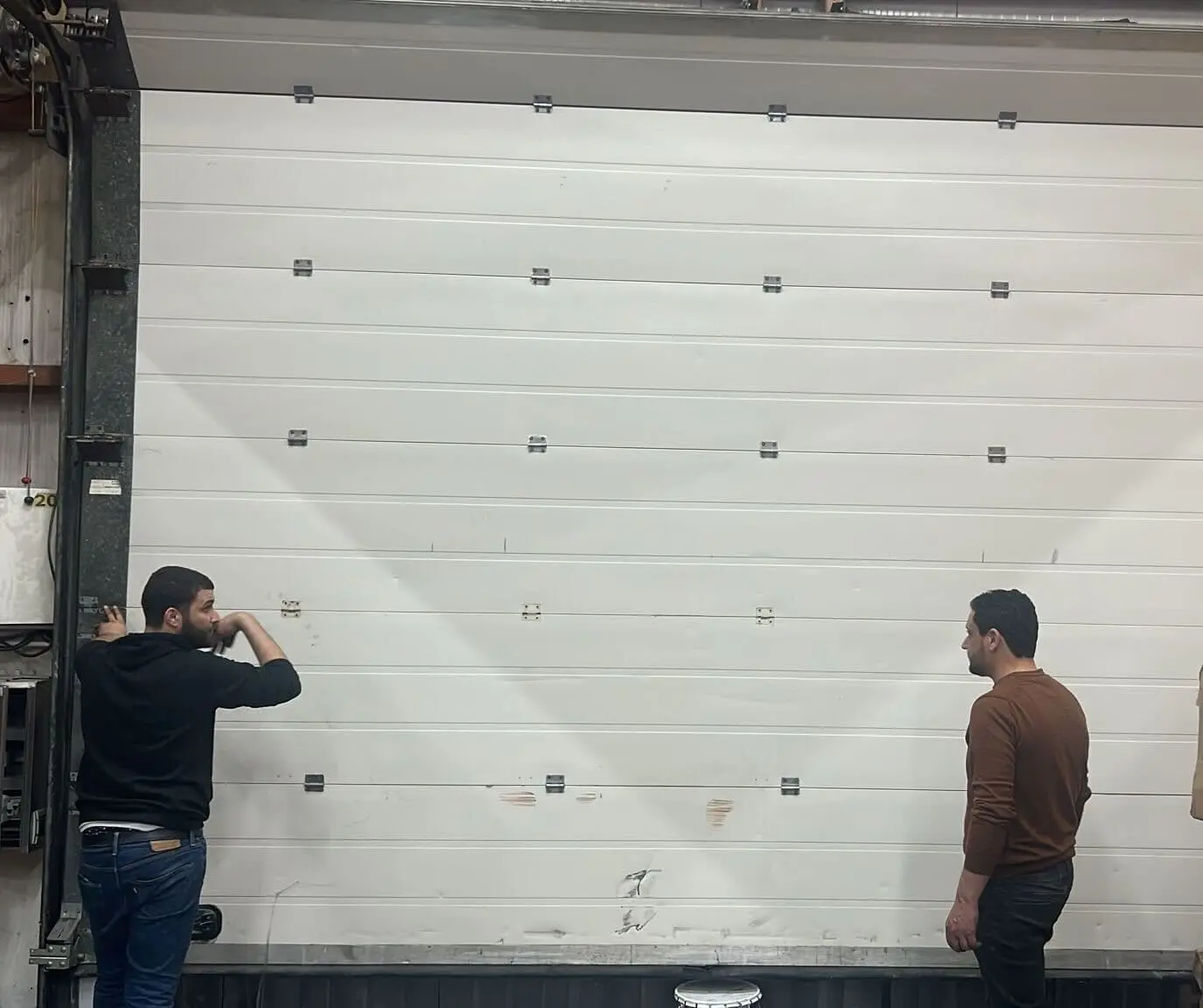 réparation porte sectionnelle à Le Thillay