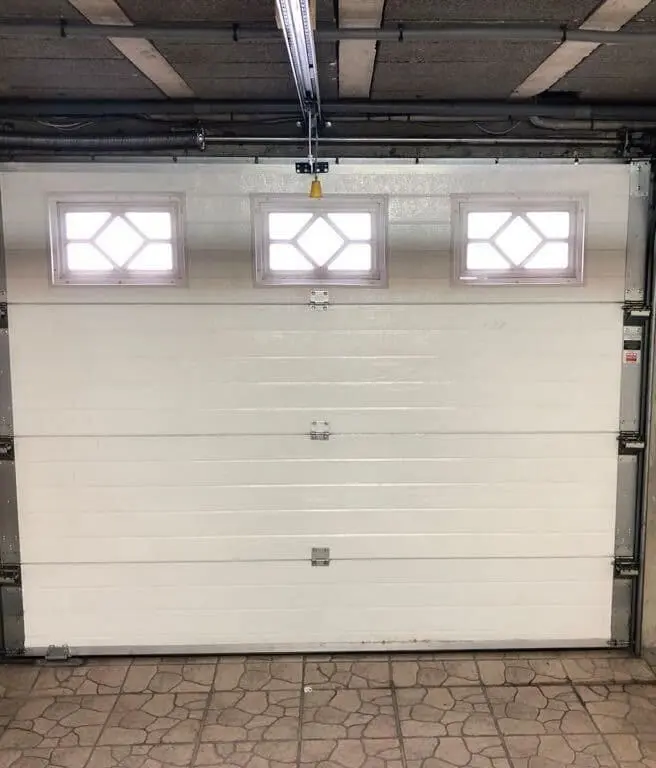 réparation de portes sectionnelles à Vémars