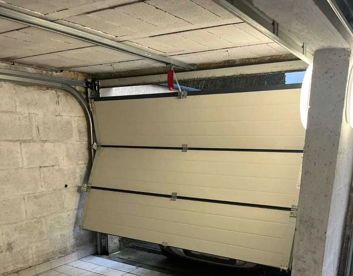 Problème d'ouverture et de fermeture sur une porte sectionnelle motorisée