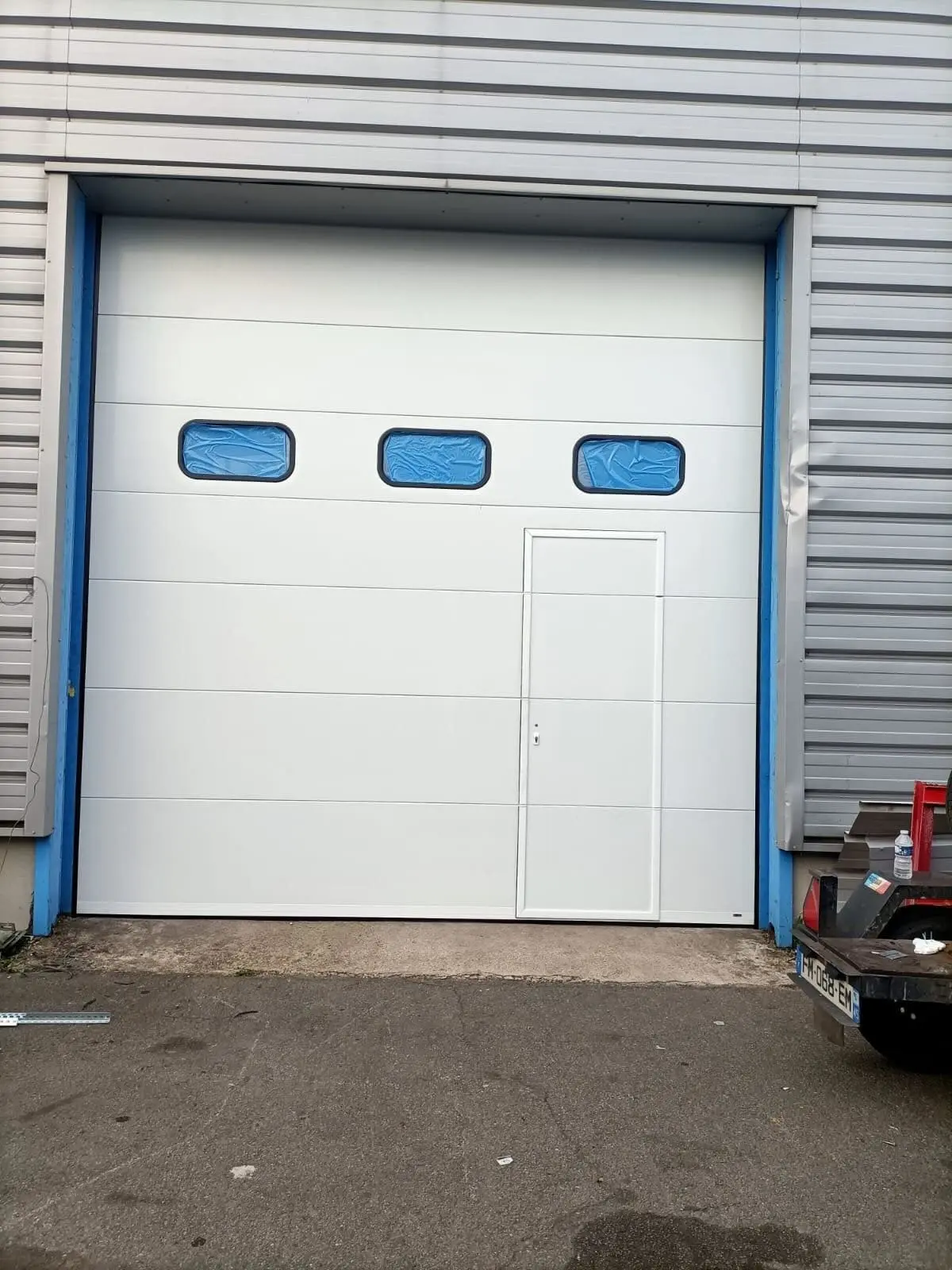 Réparation de porte sectionnelle industrielle