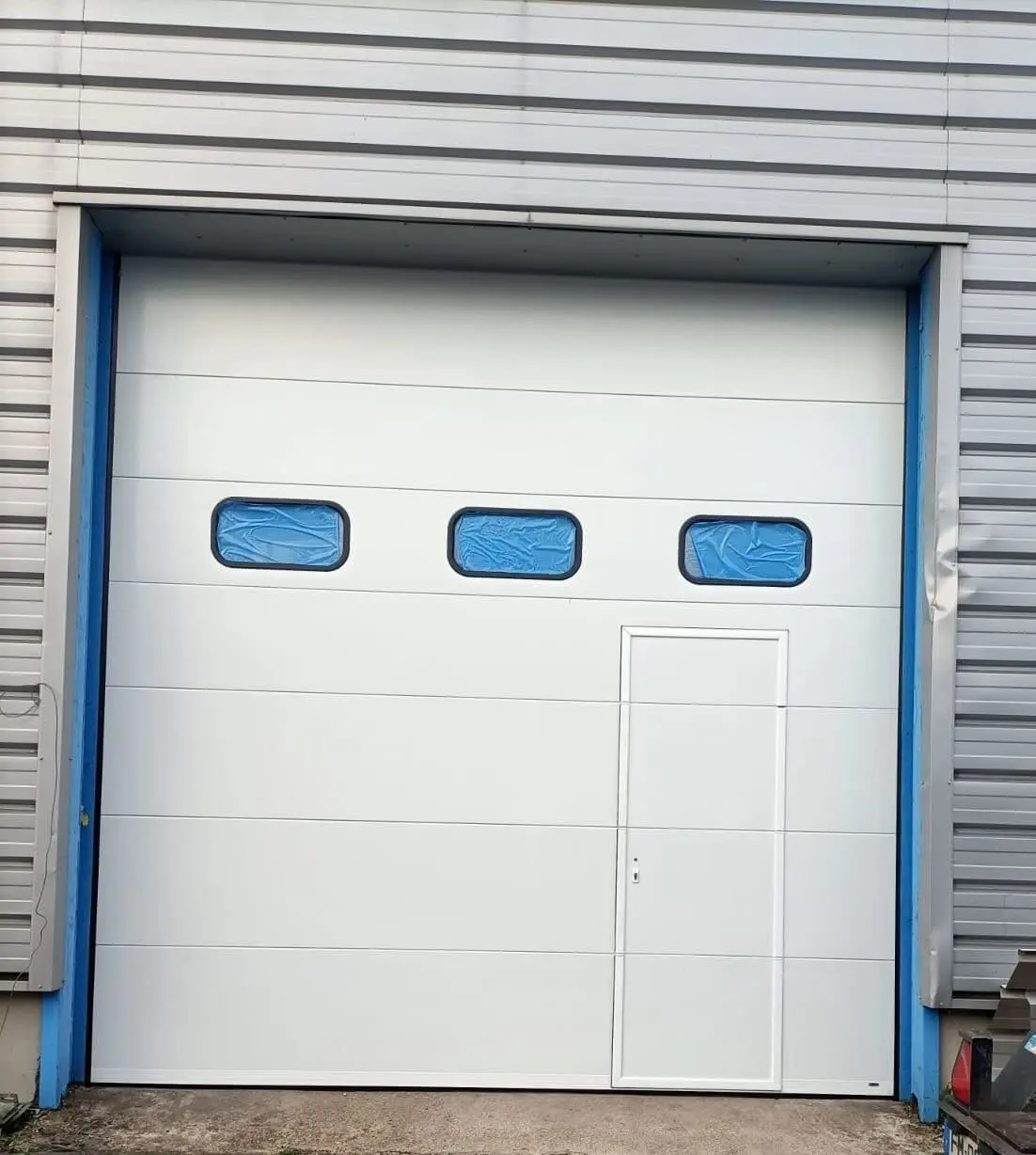 Dépannage porte sectionnelle industrielle