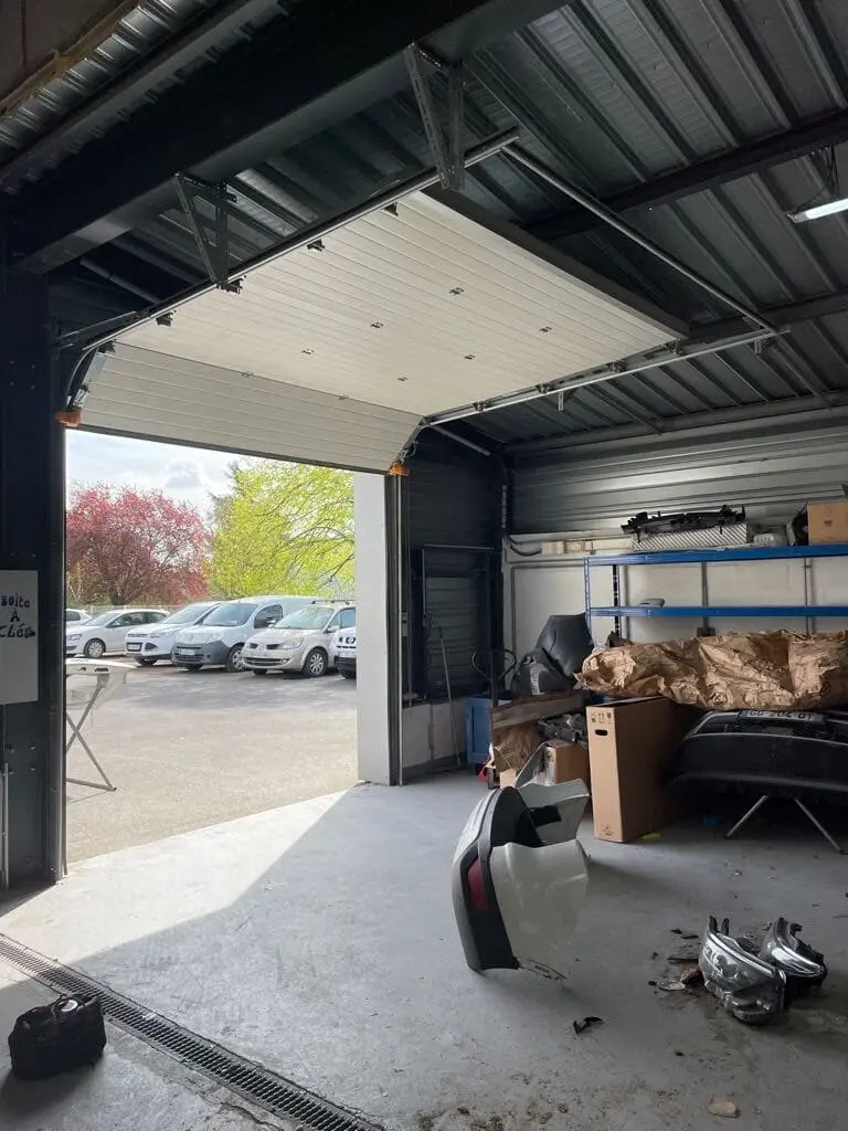 réparation porte sectionnelle à Wissous