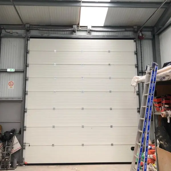 Réparation porte sectionnelle industrielle Villiers sur Marne