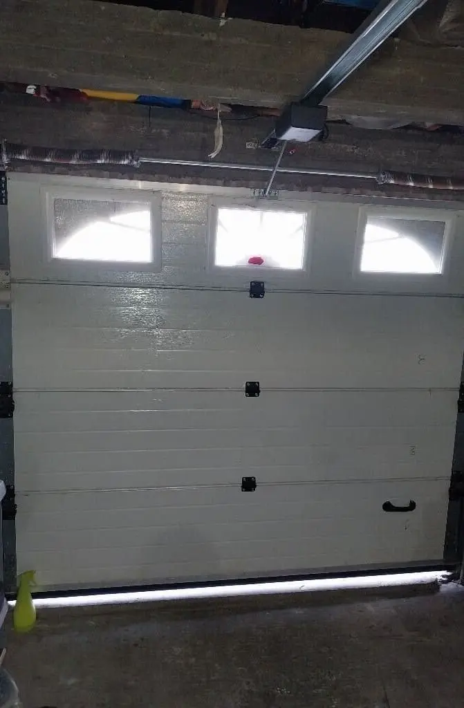 Réparation porte sectionnelle à Sèvres