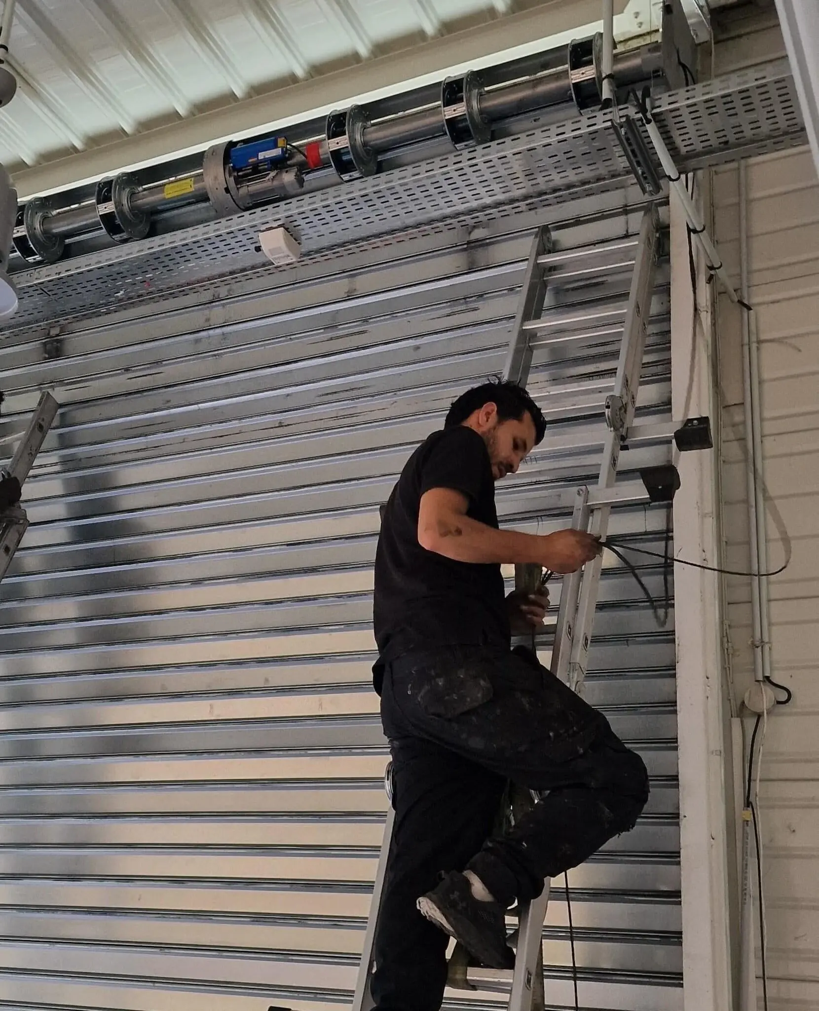 Dépannage rideau métallique Paris 20