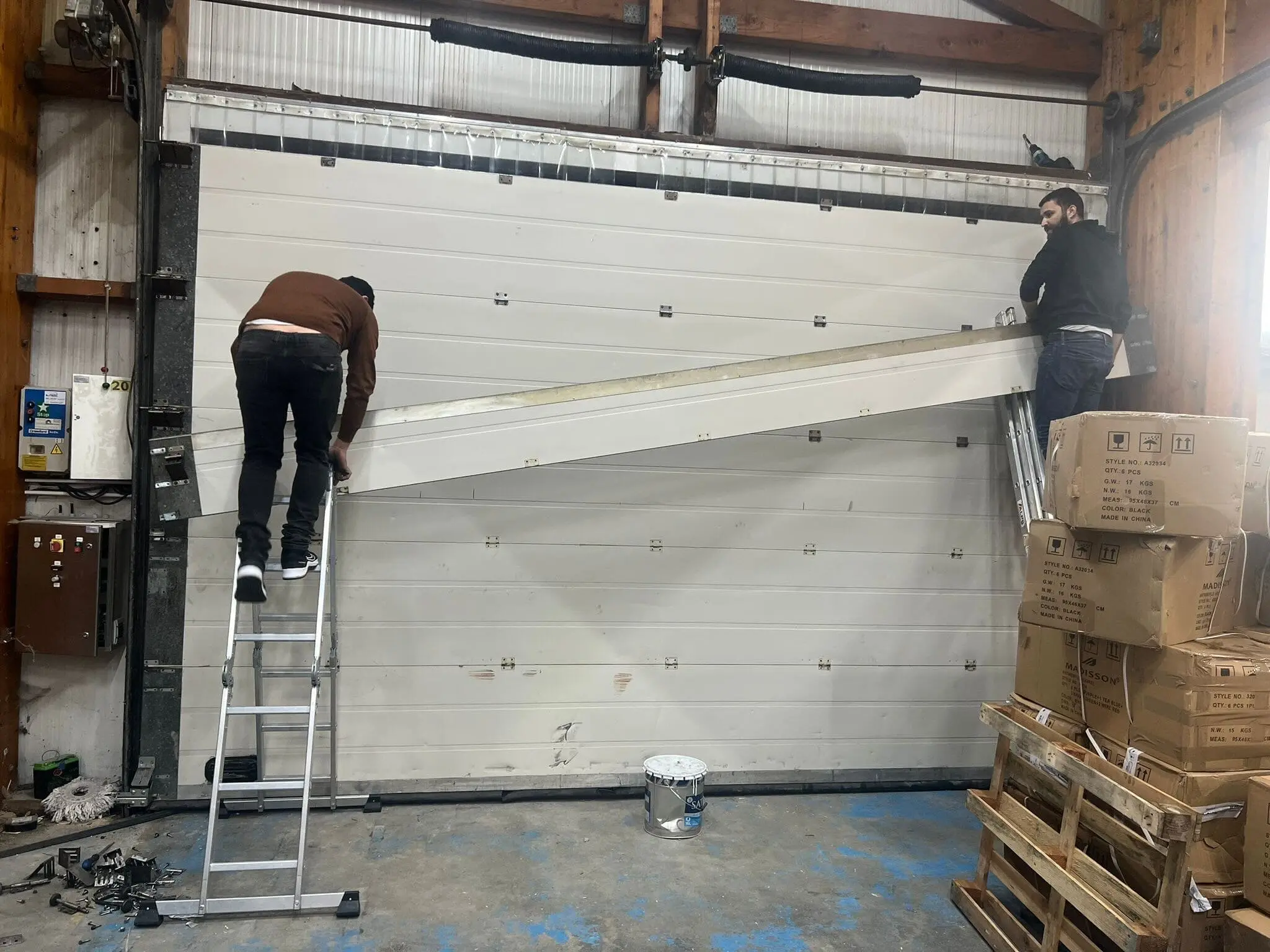 changer un panneau de porte sectionnelle