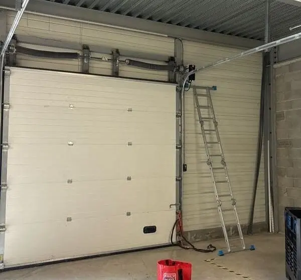 Réparation de porte sectionnelle trappes