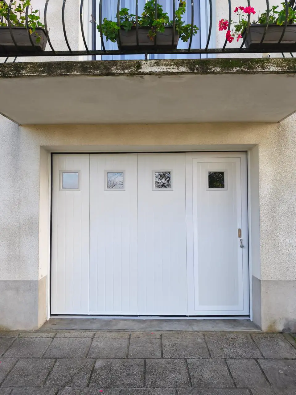 installation porte de garage sectionnelle