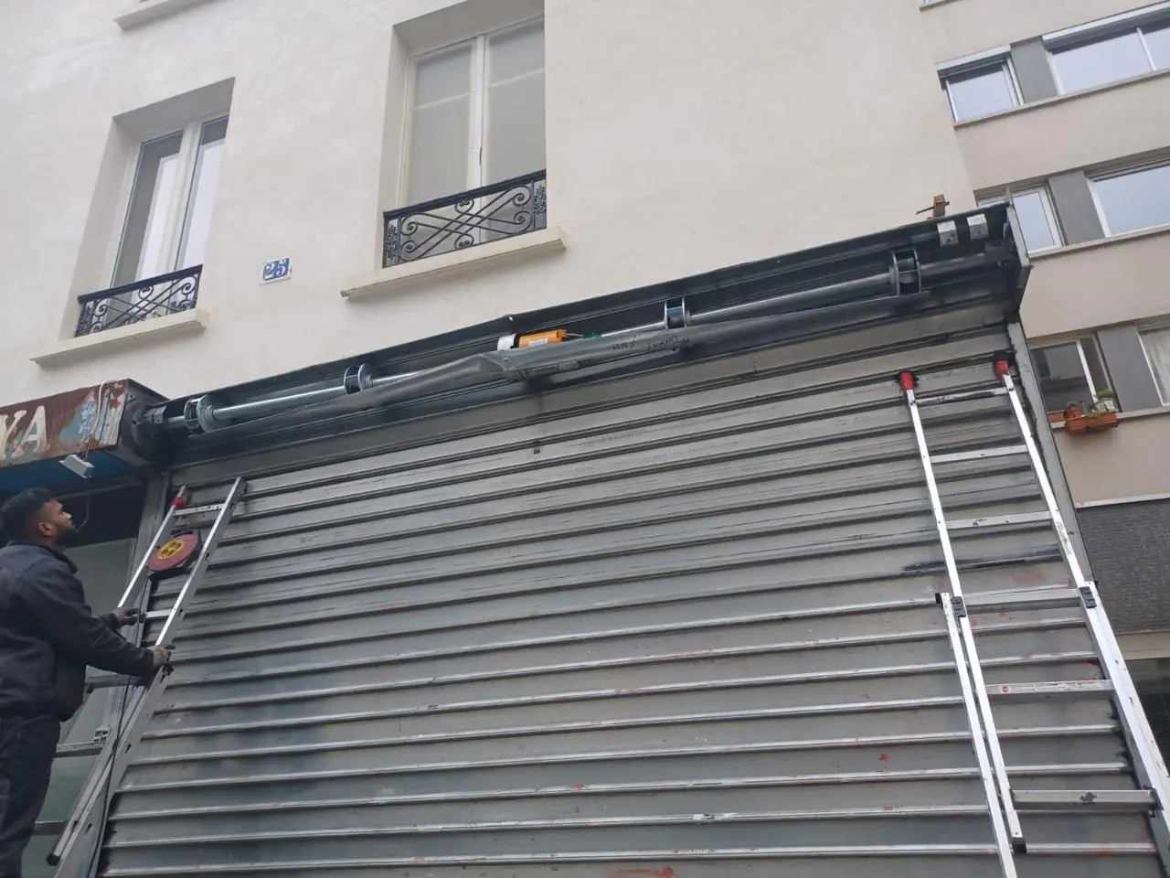 ressort cassé de rideau métallique