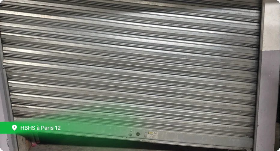 remplacement de l’axe motorisé et du tablier rideau metallique