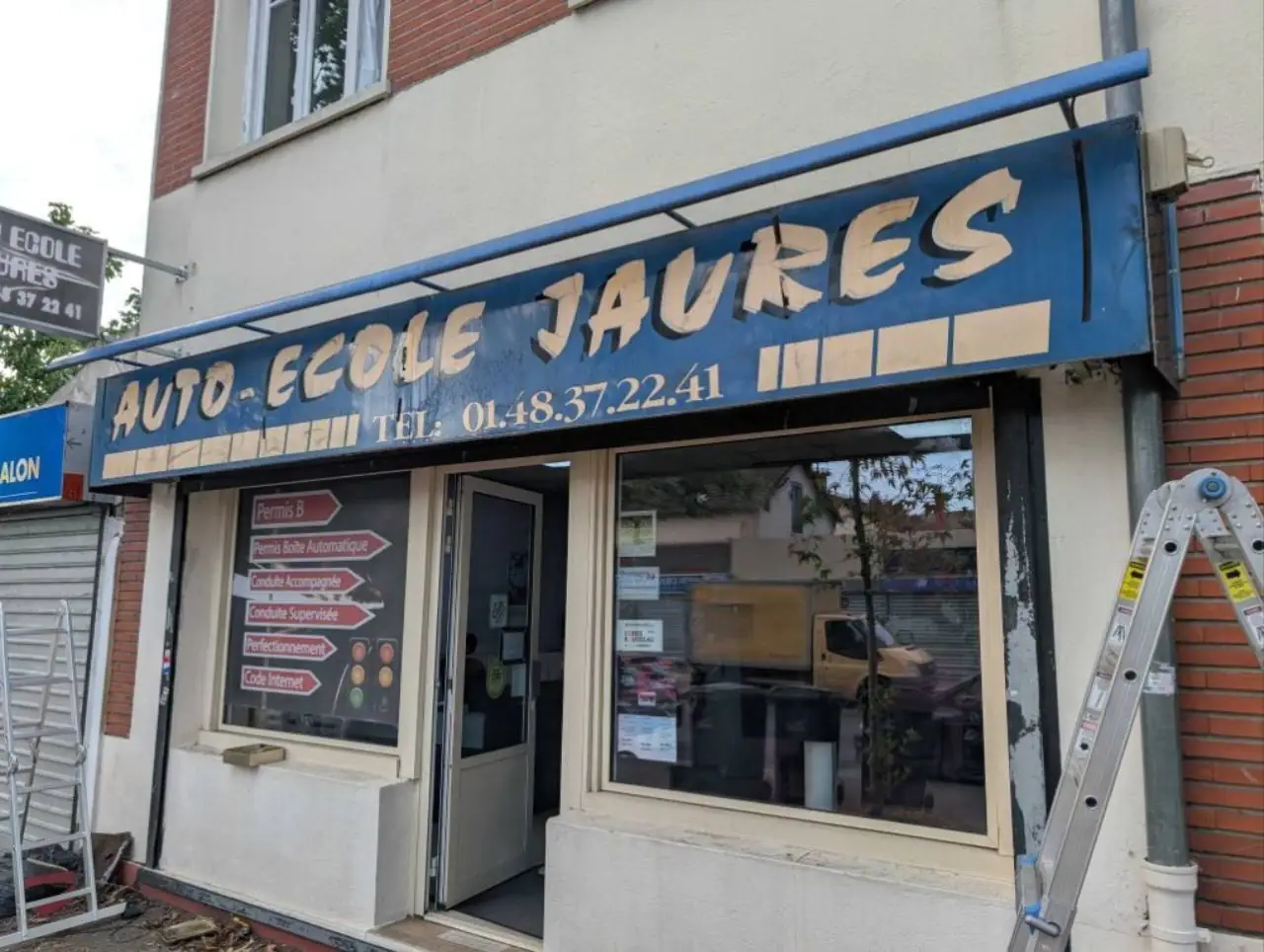 remplacement d'axe-motorise de rideau-metallique-au-bourget-93350 intervention HBHS