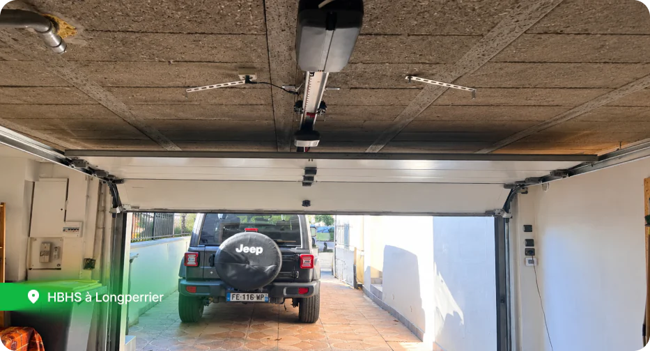 Motorisation de porte de garage à Longperrier (77) : pose d’un moteur plafond